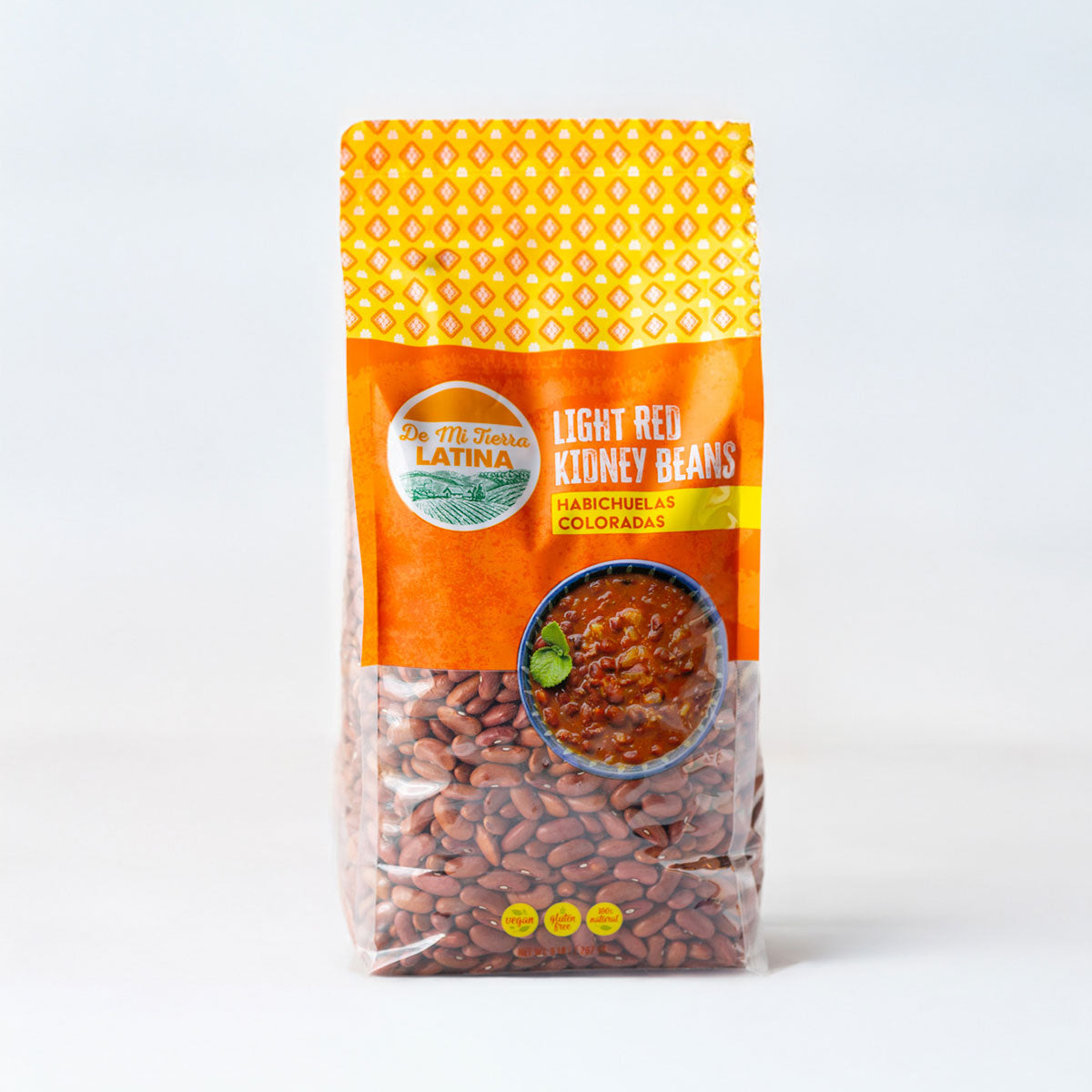 Bag of De Mi Tierra Latina light red kidney beans with a yellow and orange label on a white background