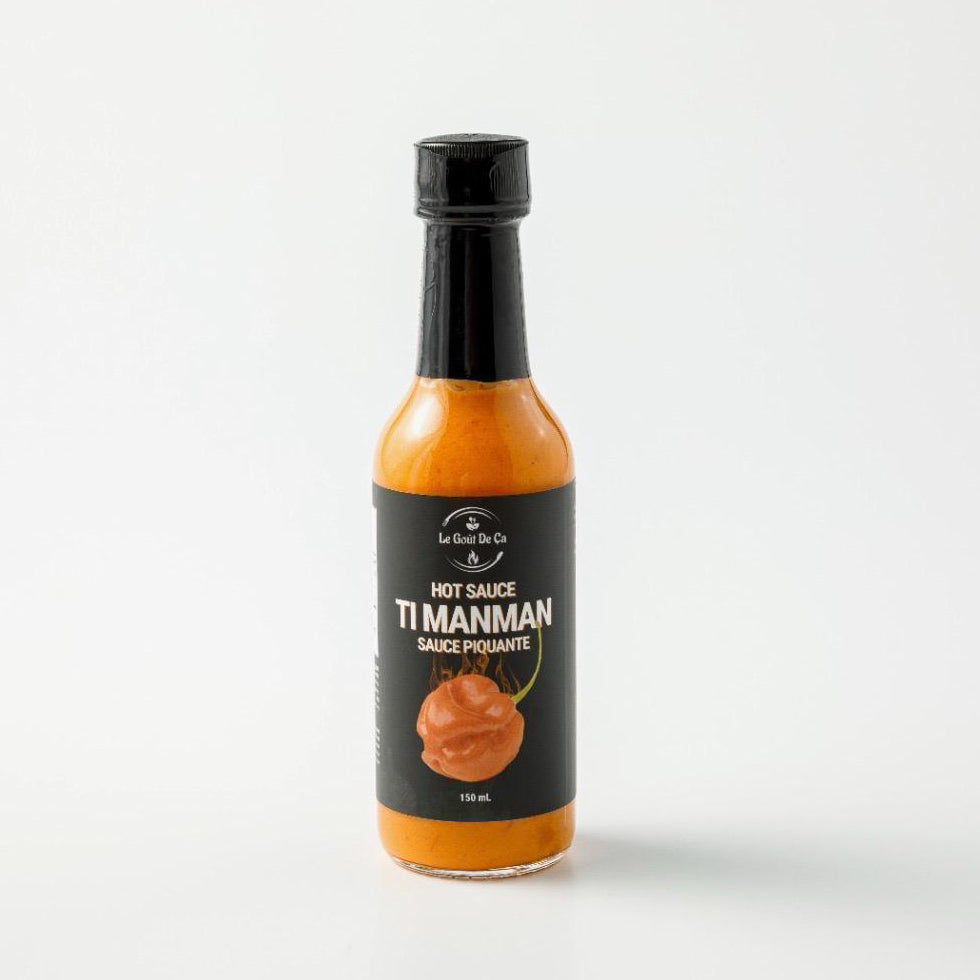 Front view of bottle of Ti Manman Hot Sauce from Leaving Gout de Ca